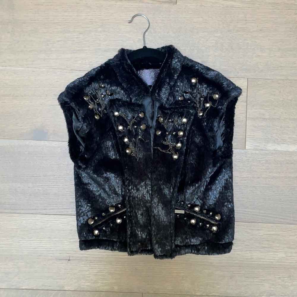 LM Lulu Paris Black Faux Fur Vest. Size M. Gently Used. Detailed buttons/chain